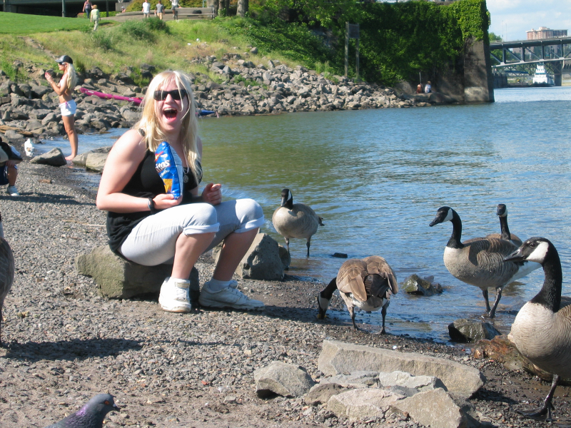 Woman Feeding Geese